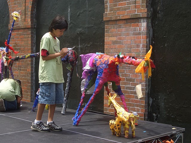 One of approximately 150 giraffes that accompanied hikers at event.