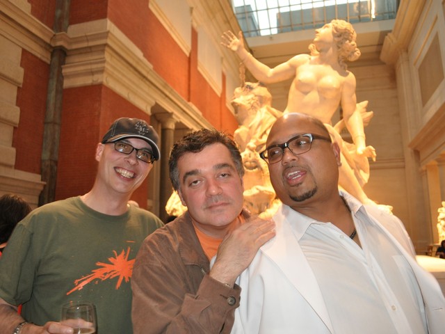 Jahmon Reed (right), 42, showed a digital art piece at the exhibition. He has worked as a security guard at the museum for the past three years.