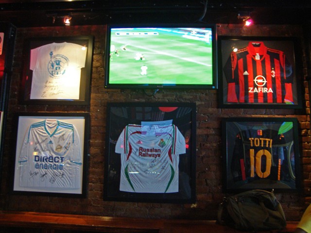 The walls at Nevada Smith's are adorned with soccer jerseys from around the world.