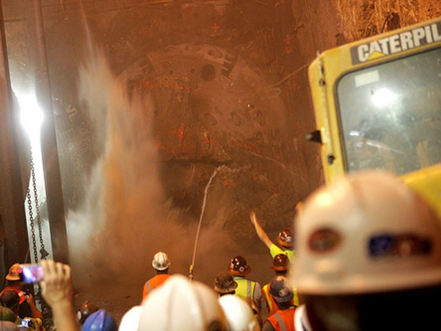 A boring machine breaks through the earth below Port Authority.