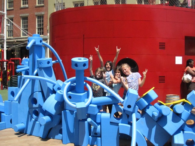 Local kids celebrate their creation and pose for their parents.