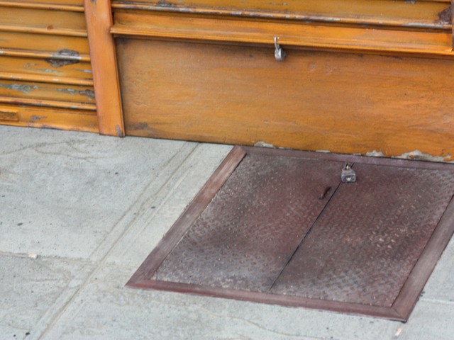 A close-up of one of the model's steel basement  doors.