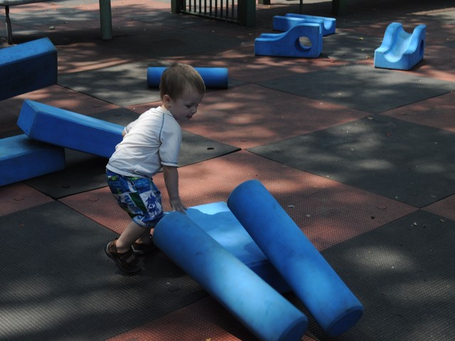 Owen Wells, 2, knocks down his creation.