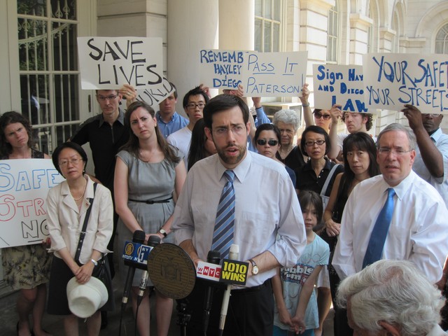 State Sen. Daniel Squadron (center), who introduced the bill, speaks at the press conference Wednesday.