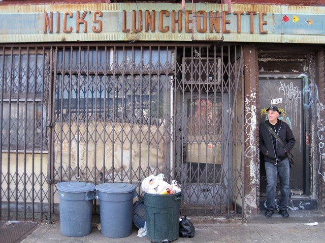 Hage in front of the real Nick's Luncheonette at 196 Broadway in Williamsburg, Brooklyn.