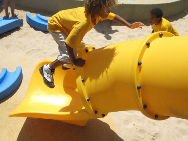 Kids even found a different way to play on one of the park's more traditional elements: a slide.