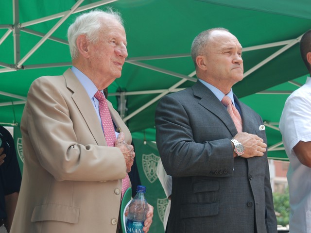 Police Commissioner Raymond Kelly and former top Manhattan attorney Robert Morgenthau stand for the pledge of allegiance at the opening of the Police Athletic League summer program.