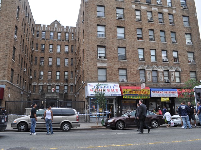 Detectives streamed in and out of the building through the morning.