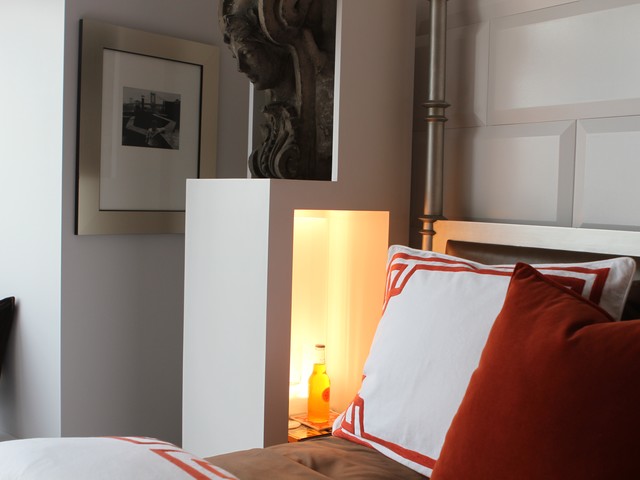 The bed has built-in cabinets that have a place for holding drinks. This is to make the space efficient, designer Vern Yip said.