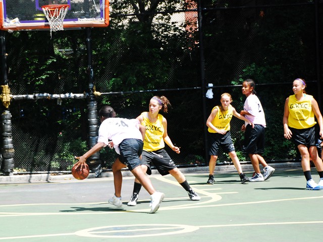 The Greenwich Village Youth Council runs the West Fourth Street Basketball Championships in the world famous Cage. Here, girl's teams Mika and the NYC Lady Warriors face off at The Cage.