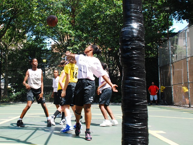 The Greenwich Village Youth Council runs the West Fourth Street Basketball Championships in the world famous Cage. Here, girl's teams Mika and the NYC Lady Warriors face off at The Cage.