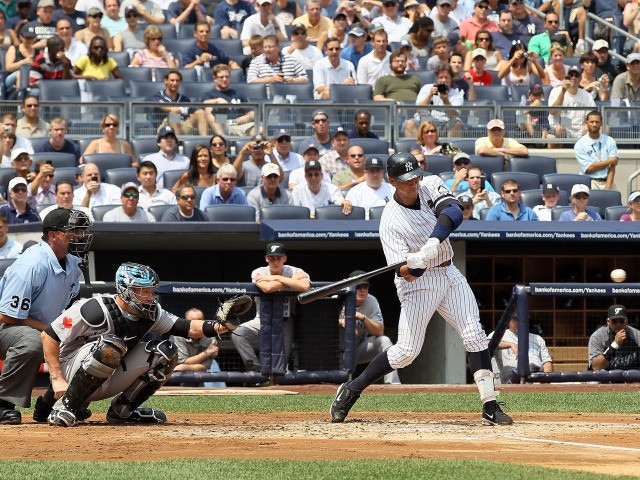 Alex Rodriguez #13 of the New York Yankees connects on his 600th career home run in the first inning against the Toronto Blue Jays on August 4, 2010 at Yankee Stadium in the Bronx borough of New York City.