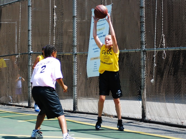 The Greenwich Village Youth Council runs the West Fourth Street Basketball Championships in the world famous Cage. Here, girl's teams Mika and the NYC Lady Warriors face off at The Cage.