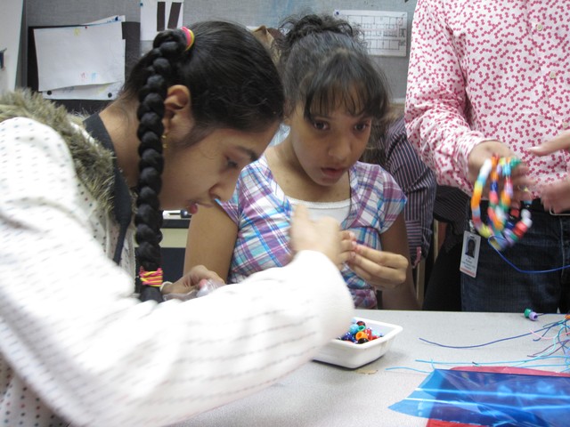 Kalsoom Ali and Valerie Liranzo got busy with beads at the Jewish Guild of the Blind's art class.