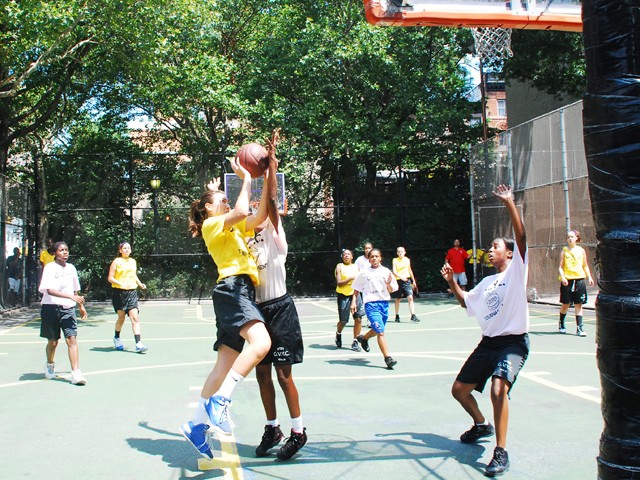 The Greenwich Village Youth Council runs the West Fourth Street Basketball Championships in the world famous Cage. Here, girl's teams Mika and the NYC Lady Warriors face off at The Cage.