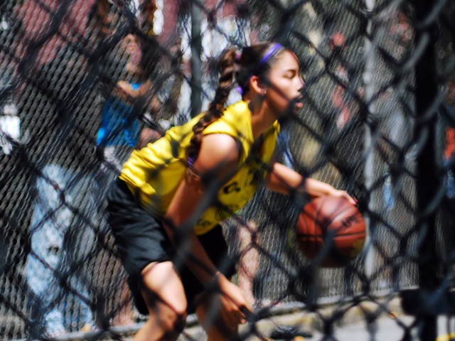 The Greenwich Village Youth Council runs the West Fourth Street Basketball Championships in the world famous Cage. Here, girl's teams Mika and the NYC Lady Warriors face off at The Cage.