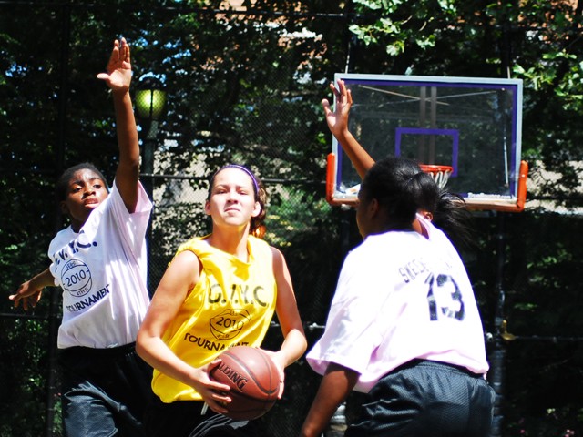 The Greenwich Village Youth Council runs the West Fourth Street Basketball Championships in the world famous Cage. Here, girl's teams Mika and the NYC Lady Warriors face off at The Cage.