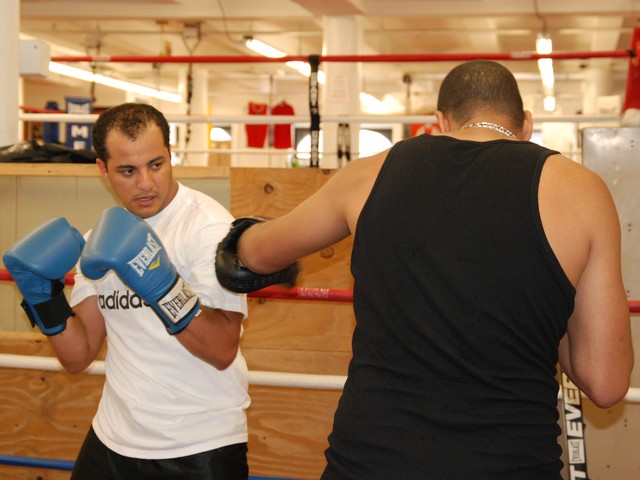 Karim Ahmed, 27, trains with instructor Emad Ali twice a week.
