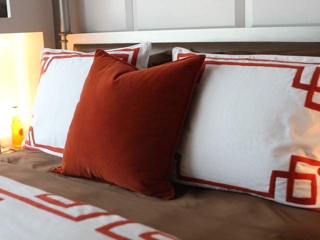 Red, white and black are prominent color schemes throughout the apartment.