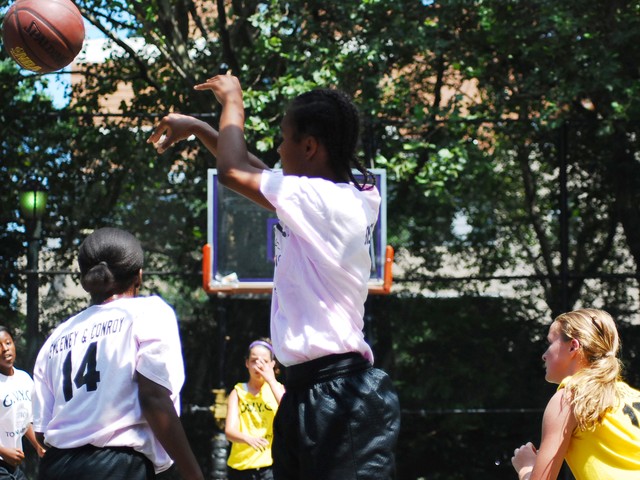The Greenwich Village Youth Council runs the West Fourth Street Basketball Championships in the world famous Cage. Here, girl's teams Mika and the NYC Lady Warriors face off at The Cage.