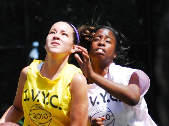The Greenwich Village Youth Council runs the West Fourth Street Basketball Championships in the world famous Cage. Here, girl's teams Mika and the NYC Lady Warriors face off at The Cage.