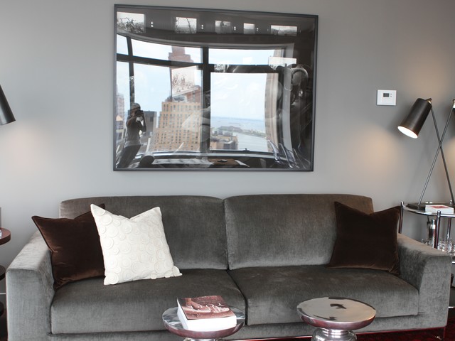 The living room couch opens to either two chaisses or a full-size bed that faces the view.