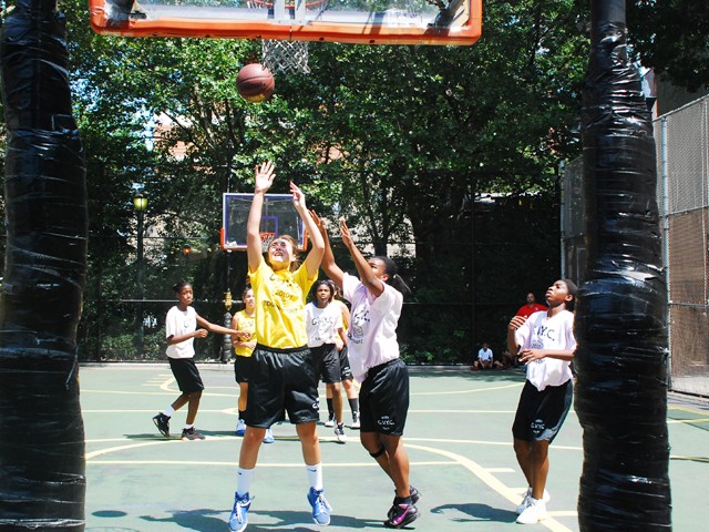 The Greenwich Village Youth Council runs the West Fourth Street Basketball Championships in the world famous Cage. Here, girl's teams Mika and the NYC Lady Warriors face off at The Cage.