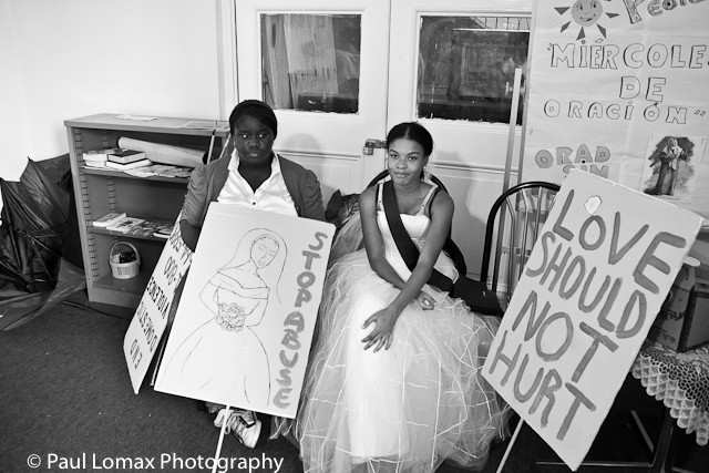 Women wore wedding gowns to symbolize violence against women by their partners.