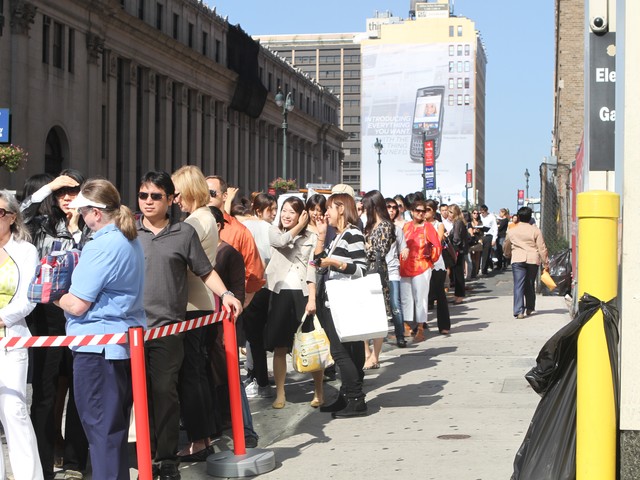 Shoppers waited with anticipation at the beginning of the line.