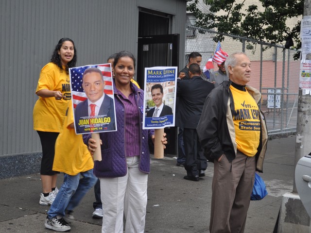 The wife of Juan Hidalgo, Male State Committee candidate for the 72ndAssembly District, campaigns for Levine and her husband.