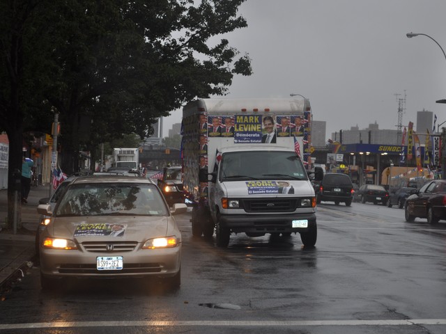 The Levine caravan drove through Inwood and Washington Heights in the rain.