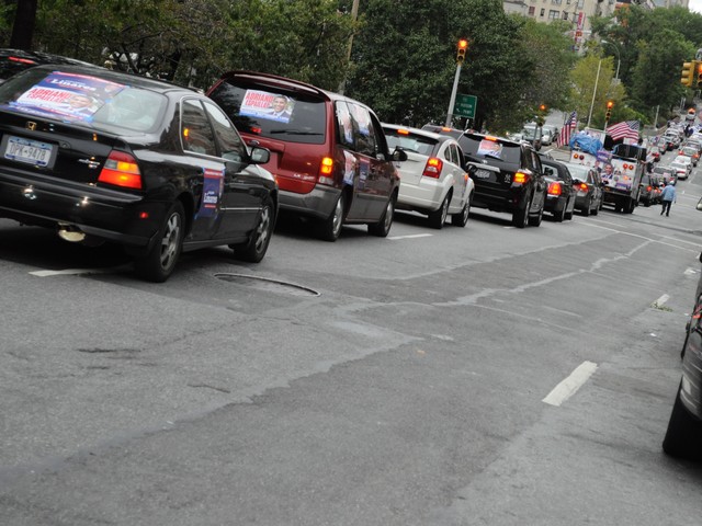 The Linares-Espaillat caravan stretched at least three blocks.
