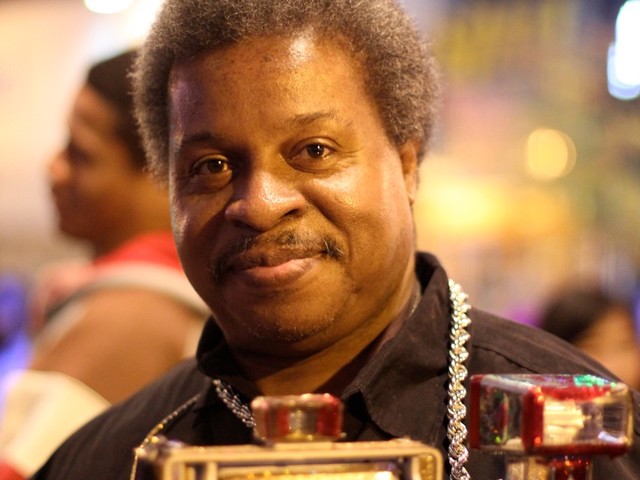 Harlem local Billy Hemmons, who's been coming to Amateur Night with the same camera for 20 years.