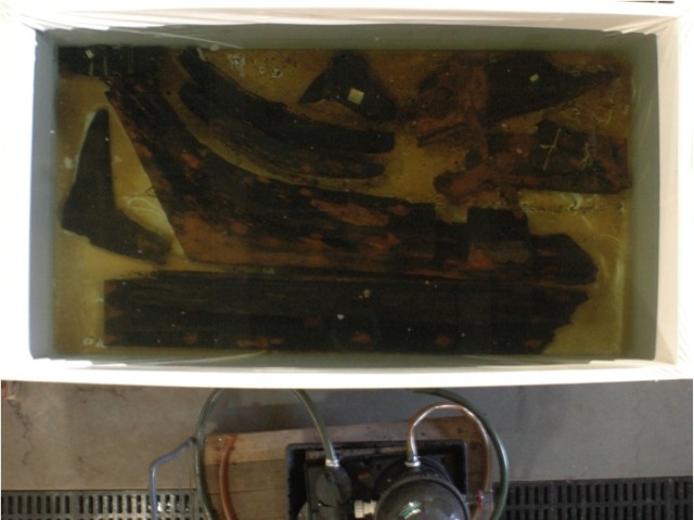 Several pieces of the World Trade Center boat sit in a tank in Maryland, in a special solution to prevent them from deteriorating.