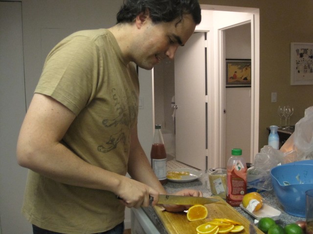 Felipe Donnelly cuts Valencia oranges for the fennel salad.