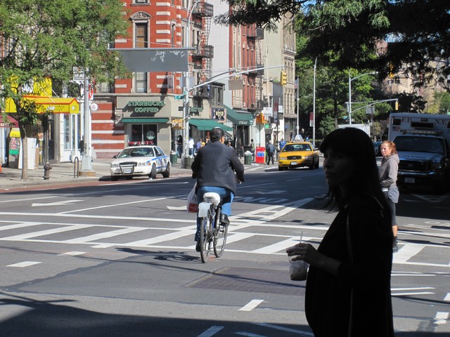 As Stringer spoke, this cyclist rode by - in the wrong direction.