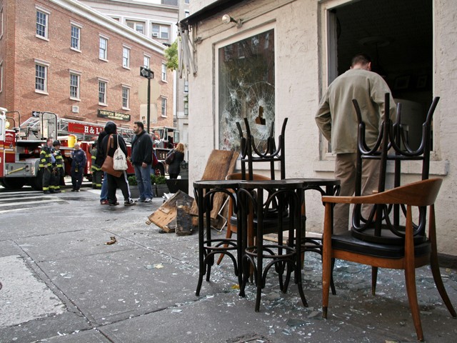 Firemen had to break several of the eatery's windows to let out smoke.