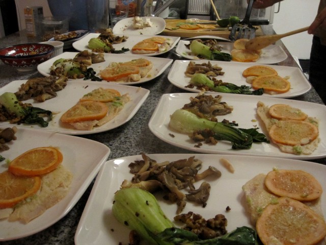The main course: baked sole with miso glaze and sliced grapefruit, walnut-studded bok choy and sauteed oyster mushrooms.