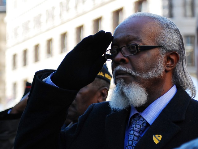 Vietnam veteran and gubernatorial debate superstar Jimmy McMillan salutes during the national anthem at the opening ceremony for the 91st annual New York City Veteran's Day Parade Thursday.