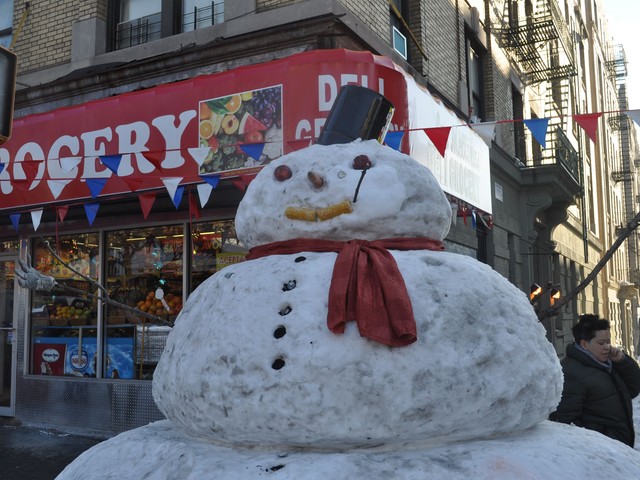 With temperatures rising, neighbors said the snowman has already shrunk several inches over the week.
