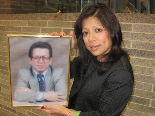 Dorris Nowilla Suda, who lives in Queens, holds a picture of her father, Nicolas, said her father's organ donations have saved more than 50 lives.