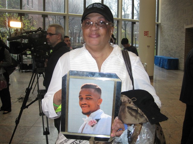 Brooklyn's Regina Mirailh holds a picture of her son, who donated his organs after a fatal car crash.