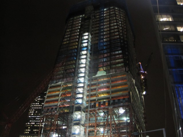 Contractor Five Star Electric swapped out clear bulbs for tinted ones to cheer up the construction of One World Trade Center for the holidays.
