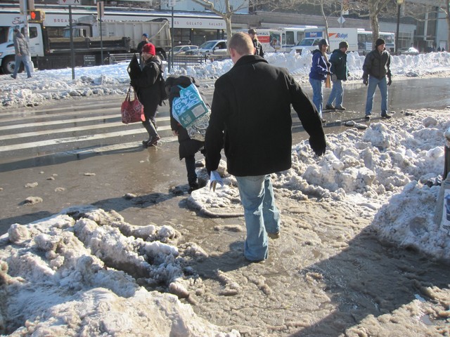 Boot-wearing passersby had no trouble dealing with the slush.