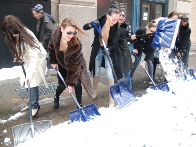 A group of exotic dancers from Cheetah Club in Midtown shoveled snow outside of their club Wednesday as part of what they said was their civic duty.