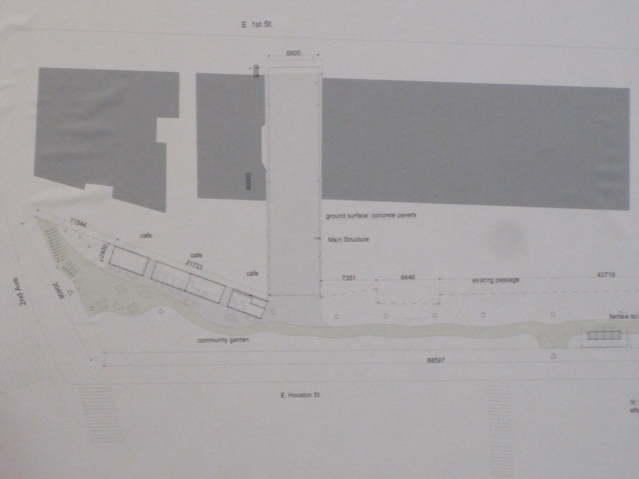 An aerial sketch of the site shows the vacant lot (lightly shaded) connecting to green space along Houston Street, where the cafe would go (rectangular outlines at bottom left).