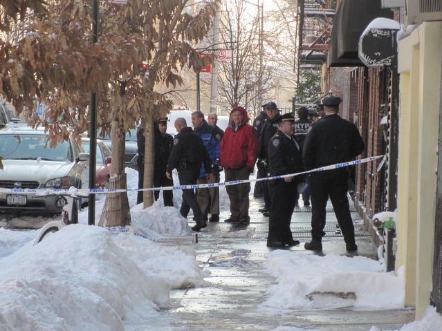 Police blocked off East 2nd Street between Avenues B and C Wednesday morning after the shooting.