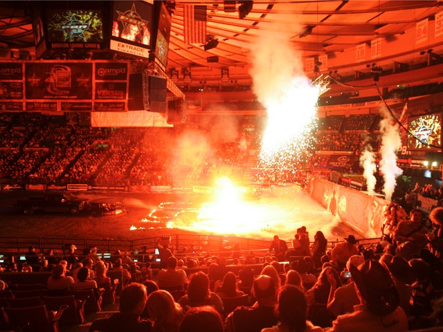 Bull riding fans watch a pyrotechnic display before the evening session of the Professional Bull Riders Versus Invitational at Madison Square Garden on Jan. 6, 2007.