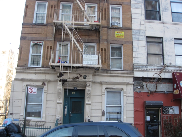 The tenement at  21 East 115th St. where residents say they have had no heat or hot water for two weeks.