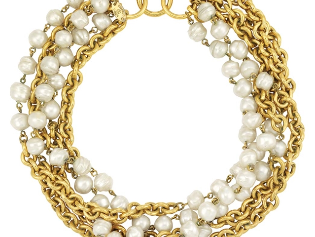 Chanel Necklace with Gold Tone Metal Links and Faux Baroque Pearls. Estimate: $1,000 - 1,200
Sold for $2,000